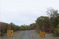 Proper braking on severe grades will keep you from having to veer into the deep gravel of a runaway truck ramp such as this one in Pennsylvania's Pocono Mountains.