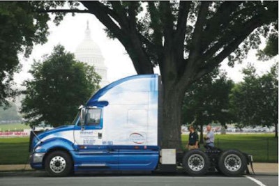 Navistar shows off this Walmart International tractor, incorporating Arvin-Meritor's hybrid system, during a Hybrid on the Hill event last June in Washington D.C.