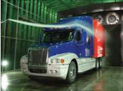 Smoke stream shows how air flows around a Freightliner truck at Daimler Trucks North America's wind tunnel.