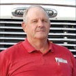 Robert Wilbur, a 23-year veteran with Bennett Motor Express and the fleet's 2008 Driver of the Year, stopped his 2004 Freightliner Classic in Cottondale, Ala., while en route from Ft. Polk, La., to Ft. Campbell, Ky., with a cargo truck and John Deere gator loaded on his 53-ft. step-deck.