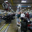 Cameras Capture The Action As A 16 Liter Mack Mp10 Engine Is Lowered Into A Waiting Titan Chassis At Mack Macungie Assembly Operations Outside Allentown, Pa