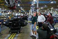 Cameras Capture The Action As A 16 Liter Mack Mp10 Engine Is Lowered Into A Waiting Titan Chassis At Mack Macungie Assembly Operations Outside Allentown, Pa