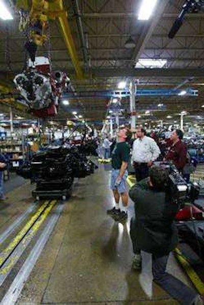 Cameras Capture The Action As A 16 Liter Mack Mp10 Engine Is Lowered Into A Waiting Titan Chassis At Mack Macungie Assembly Operations Outside Allentown, Pa