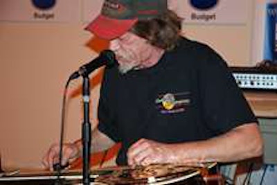 Ex-trucker Watermelon Slim performs at Overdrive offices in Tuscaloosa, Ala. (Photo Max Heine)