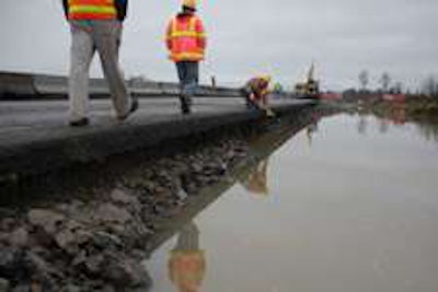 Flooding damaged roads and bridges in Rhose Island.