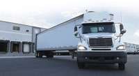Customers driving trucks with 2010 engines, such as this Freightliner from Penske Truck Leasing, report fuel economy improvements as high as 7 percent, Penske says.