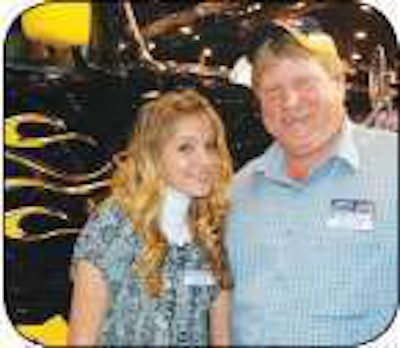 Robert Snyder and his daughter, Savannah, stand next to the Volvo VNL 670 he won through Arrow Truck Sales’ Back On The Road competition.