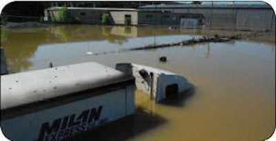 This is one of the trucks stranded when rains hit Nashville, Tenn., in May. The downtown TravelCenters of America might not reopen until this month.