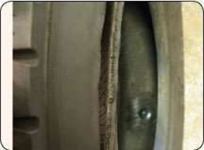 In this zipper failure, the gash is wide and the cords are completely separated. Such a tire can explode and seriously injure the person installing it.