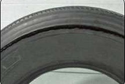 This rupture results from excessive flexing and heat from underinflation or overloading. Not only do the steel cords bend beyond the point where they can easily spring back, but the heat weakens them and the other parts of the casing’s structure.