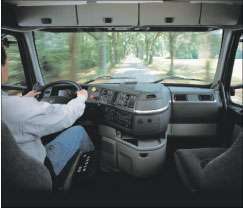 The VN780’s tricked-out cab offers comfortable seating and easy-to-reach control systems. Front and side visibility is exceptional. The bunk folds up to make room for a table, complete with convenient power outlets. Storage space is plentiful.