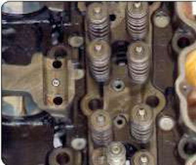 This Caterpillar C15 run on Shell Rotella T4 for nearly 670,000 miles shows negligible sludge on the top surface of the cylinder head – a surface that’s very hard to keep free of deposits. Quality oil includes detergent additives that keep combustion byproducts dissolved so they cannot attach themselves to engine parts.