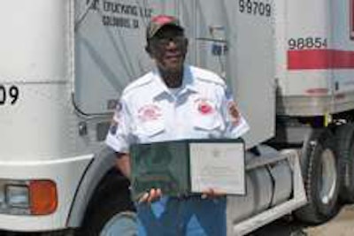 Lonnie Davis displays his Highway Angel award.