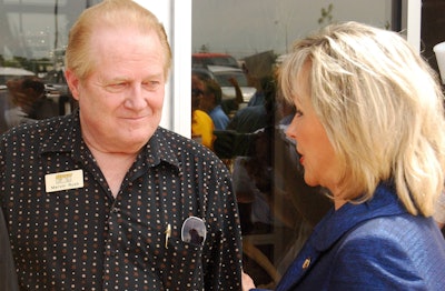 W. Marvin Rush (left), speaking to then-candidate (now Oklahoma governor) Mary Fallin at the grand opening almost a decade ago of the Rush Truck Centers Oklahoma City facility.