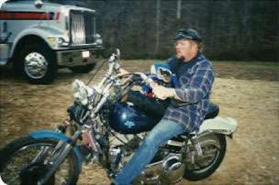 Dan Heister and his son take a ride around their yard on Dan’s 1980-model Harley-Davidson. He bought the motorcycle in 1982 and still owns it. His International is in the background.