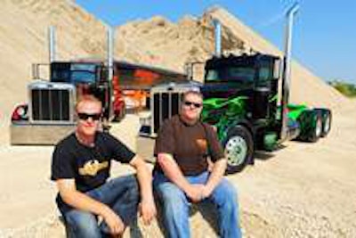 Johnathan (left) and Pat Eilen with their winning rigs. (Photo Bruce W. Smith)