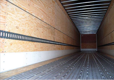 The heavy-duty aluminum floor reduces weight in this plywood-lined Utility 4000D dry van. The floor carries a 16,000-lb. fork truck rating.