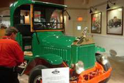 A customer views an early Mack truck in the new Mack Museum and Heritage Center.