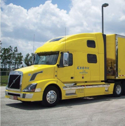 Tom Meunier hauls expensive cars with this and another Volvo VNL, both powered by D16s, which get as high as 7 mpg.