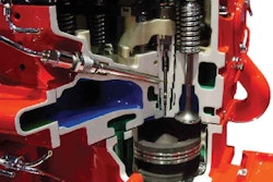 The high-pressure fuel line passes through the cylinder head and connects to the injector of a 2010 15-liter ISX. Since pressure is supplied by the XPI fuel system’s common rail, the injector is no longer camshaft-operated, but just a valve opened and closed by the ECM.