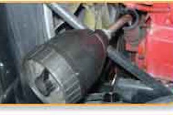 K.L. Harring Transportation and Warehousing of Bethel, Pa., uses a tank and an air-powered pump to install oil.
