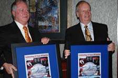 U.S Xpress Co-Founders Max Fuller (left) and Patrick Quinn receive commemorative anniversary plaques.