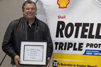 Jerry Kissinger receives Shell award.