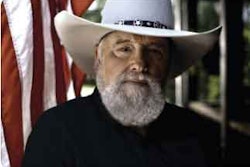 Country Hall of Fame singer Charlie Daniels first hit the country music charts in 1975 with his rebel anthems “Long Haired Country Boy” and “The South’s Gonna Do It.”