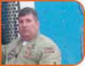 Before signing with a carrier, Karl Phares has a date with the U.S. Army in Iraq.