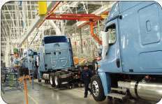 New truck fuel efficiency rules will cut fuel consumption and greenhouse gas emissions beginning with 2014 models.