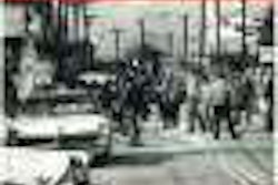 Pressure from the Teamsters, as reflected in this December 1969 cover photo of violence involving steel haulers, was one of the early conflicts owner-operators faced.