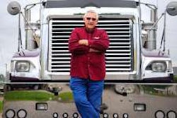 Larry Severson and his 2001 International.