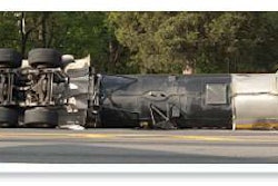 Tank haulers must watch their speed on curves to avoid situations such as this one, where a slight road grade makes a turn even more precarious.