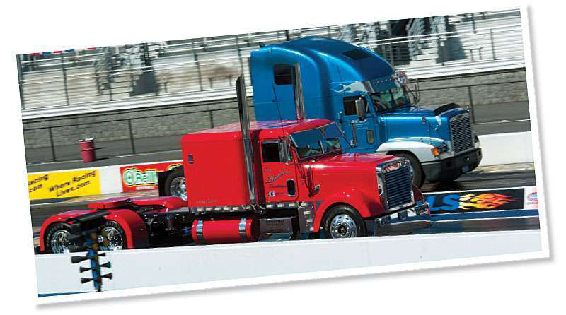 Troy Huddleston of Willow Hill, Ill., pits his 1991 Viper red Freightliner Classic against Millers Creek, N.C., resident David Miller and his 1999 Freightliner FLD120 in the qualifying rounds of the show&rsquo;s diesel drag races.
