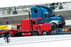 Troy Huddleston of Willow Hill, Ill., pits his 1991 Viper red Freightliner Classic against Millers Creek, N.C., resident David Miller and his 1999 Freightliner FLD120 in the qualifying rounds of the show’s diesel drag races.