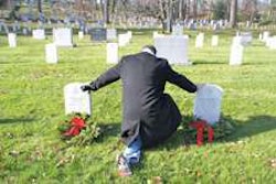 Mike Reilly of Randall-Reilly pays tribute at Arlington National Cemetery.