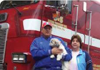 Steve and Doris Bixler, leased to Reed Trucking, haul sand for hydraulic fracturing to natural gas wells with this 1989 Freightliner cabover and copmany owned pneumatic tank.