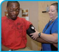 Examiner trainers urge truckers to be aware of their basic health conditions, especially knowing your blood pressure, such as Jackson, Miss.-based trucker Fred McGee, prepares to find out at Workforce Testing in Tuscaloosa, Ala.