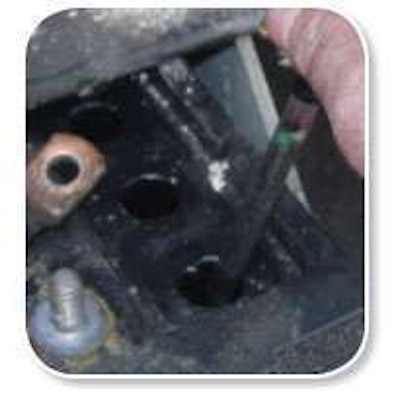 A hydrometer can be used to measure charge by indicating the density of the electrolyte in the cells of conventional batteries. When fully charged, the colored balls float, as shown here.