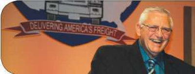 A trucker for 49 years, Larry Severson accepts his award at the Truckload Carriers Association annual meeting in Orlando, Fla. Severson will be featured in the May Overdrive.