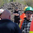 Drivers protest as a policeman stands gaurd at the Windsor-Essex Parkway project this weekend. (Photo from The Windsor Star website.)