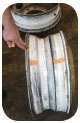 During tire work turn the wheel so the narrower of these inner bulges is facing upward.