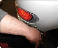This 2013 Peterbilt has a headlight vertical adjustment near the rear of its lens that can be adjusted with a Torx screwdriver. There’s no horizontal adjustment.