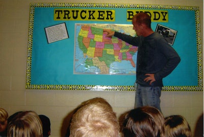 January Trucker Buddy of the Month Roy Sewell teaches a third grade class in Dublin, Ohio, a brief geography lesson.