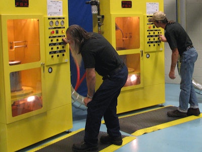 A DPF cleaning machine, such as this one at a Mack Trucks testing facility, can cost as much as $75,000, which is why cleaning fees are so high.