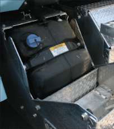 The 23-gallon diesel exhaust fluid tank is sized for long-haul application, hidden in the forward toolbox on the driver’s side behind the polished deckplate.