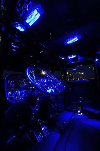 Stephen Ashburn says he got the idea to light up his interior with bright blue LEDs from another truck on the highway. “I liked it, and I wanted to do it to my truck,” he says. The car hauler went to a shop that had Woody’s lights, and he bought six of them to replace the lights already hung in the interior. When trimming later, he added two more blue oval lights.