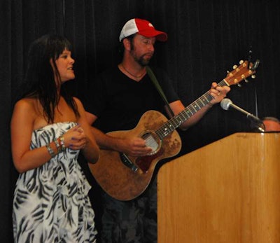 Country singer-songwriter Lindsay Lawler and songwriting partner and guitarist/vocalist Chris Roberts performed “He Loves the Road” and “Highway Angel” before the winner was announced.