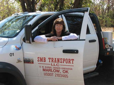Sue Burns sought a professional image for her website by posting contact information, a brief description of her hotshot hauling service and photos of her 2011 Dodge Ram 5500 and Maxey 20-foot flat flat trailer.