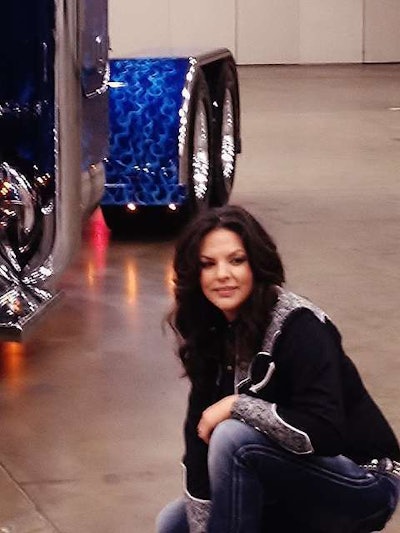 Teresa Danielson — who’s not a participant in the Most Beautiful contest — is pictured here in front of Jerad Wittwer’s 2006 Peterbilt 379, which won the 2012 Pride & Polish National Championship. Danielson is a truck driver from Manitoba, Canada. The winner of the contest will be treated to a similar photo shoot in Dallas in August this year.